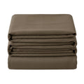 Noctura full blackout curtain folded in a stack on a white background
