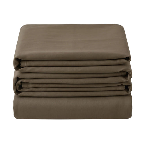 Noctura full blackout curtain folded in a stack on a white background
